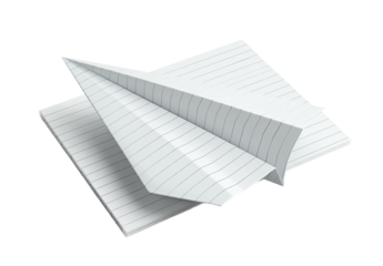 A folded paper airplane, created from lined paper, rests on another folded paper sheet