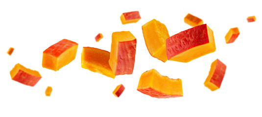 Rectangular slices of red pumpkin fly and levitate in space. Isolated on white.