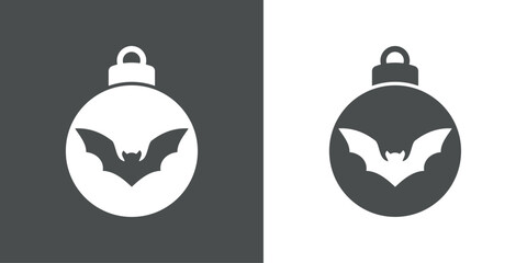 Tiempo de Navidad. Decoración de Halloween. Logo con silueta de bola de navidad con murciélago para tarjetas y felicitaciones