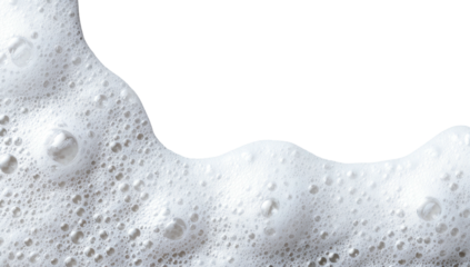 Close-up of foamy suds over black background, showing bubbles and texture