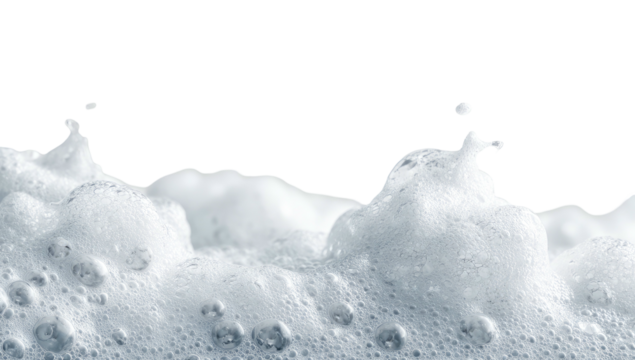 Close-up of frothy white bubbles, resembling ocean foam, against a black backdrop