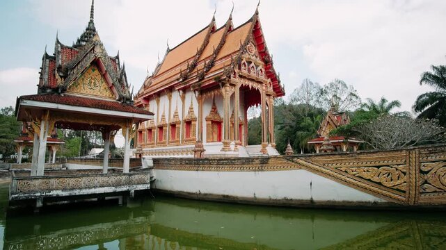 Ornate wat bang riang temple, revealing traditional buddhist architectural elegance in peaceful tropical scenery Phang nga province, Thailand.