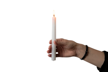 hand holding a single lit candle. Isolated on transparent background, png