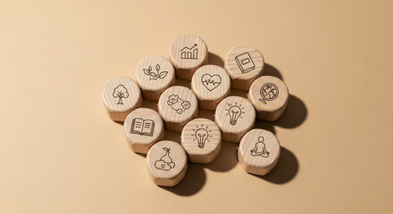Collection of wooden blocks with various business and finance icons, symbolizing growth, ideas, and strategy
