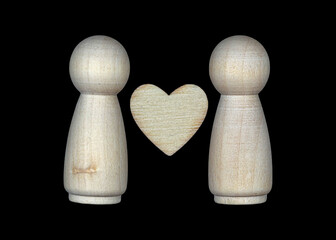Two wooden figures and a heart symbolizing love and connection between people in a simple and artistic style