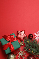 Festive scene with wrapped gifts, candies and decorations, sometimes on a bright red background, conveying Christmas greetings and celebration
