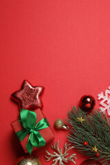 Festive scene with wrapped gifts, candies and decorations, sometimes on a bright red background, conveying Christmas greetings and celebration

