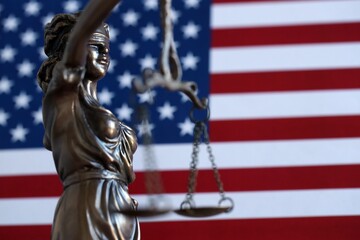 United States of America in Law and Justice statue of Lady Justice with USA flag