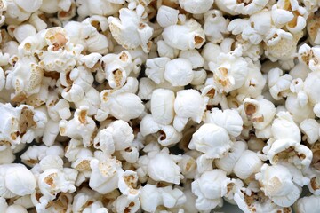 Salt Popcorn Texture Abstract Background. Big amount of pop corn