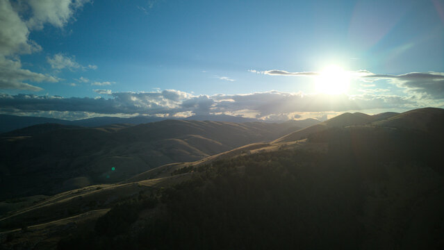Drone aerial view of Castel del Monte, Abruzzo, a medieval hilltop village with ancient stone architecture and panoramic landscapes - Powered by Adobe