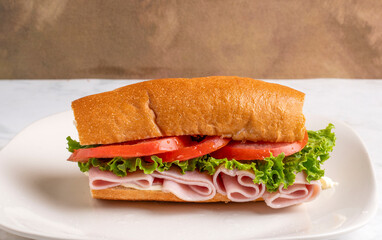 ham sub  with lettuce and tomatoes