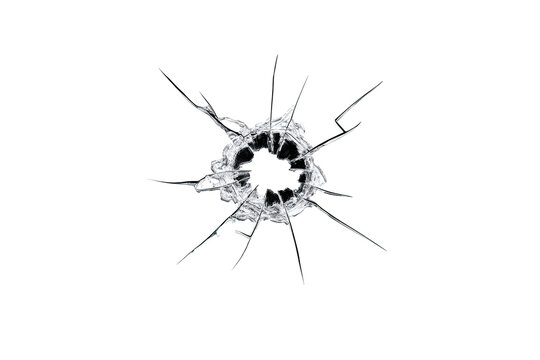 A close-up of a broken glass surface, with a circular fracture and radiating cracks