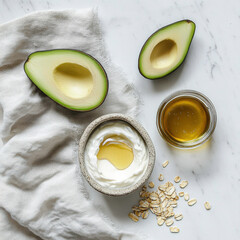 A bowl of yogurt and a half-eaten avocado sits on a table with a white cloth. A jar of honey is also on the table. Concept of health and wellness, as the ingredients are all natural and nutritious
