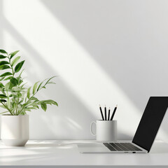 A laptop sits on a desk next to a potted plant and a mug. Concept of productivity and focus, as the laptop is likely being used for work or study. The potted plant adds a touch of nature