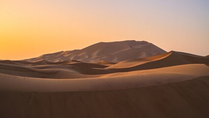 Majestic desert mountain bathed in warm golden hour sunset light