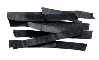 Monochrome shot of torn, textured, dark-gray strips haphazardly arranged against black