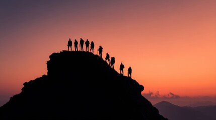 Silhouette of the team on the mountain. Leadership Concept.