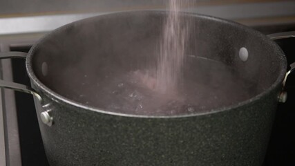  large pot filled with vigorously boiling water steaming on the stovetop