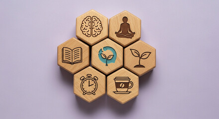 Fototapeta premium Conceptual arrangement of wooden hexagons symbolizing personal growth, learning, mindfulness, health, and productivity