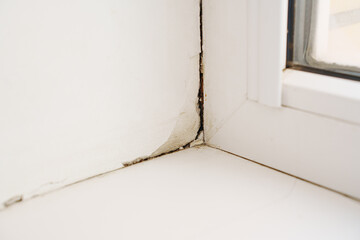 Door or window reveal showing structural details and wear over time