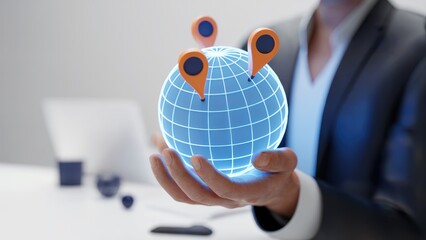 Global business reach concept with glowing globe and map pins held by professional for international expansion