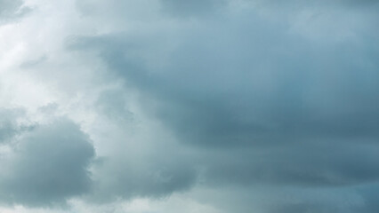 Fototapeta premium Close up view of some cumulus clouds during stormy weather timelapse.
