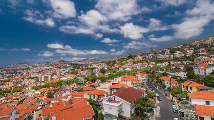 Aerial view from the mountain over the rooftops from cable car on Madeira timelapse hyperlapse.