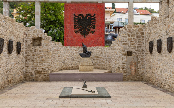 Interior of the Mausoleum of Skanderbeg in Lezh&euml;, Albania, featuring the memorial statue, Albanian double-headed eagle emblem, and symbolic relics honoring the national hero.