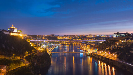 Day to night view of the historic city of Porto, Portugal timelapse with the Dom Luiz bridge © HyperlapsePro