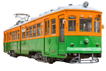A retro orange and green electric streetcar with visible windows, tracks, and overhead power lines