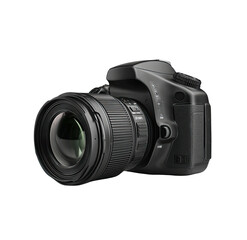 Fototapeta premium A modern, black digital single-lens reflex camera angled slightly to the right, isolated on black