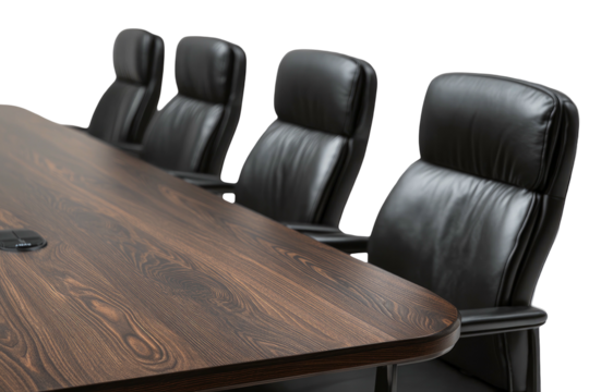 A conference room setting with a dark wood table and leather chairs set against a black background