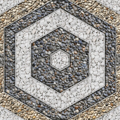 Hexagonal Mosaic Pattern with Pebbles and White Stone.