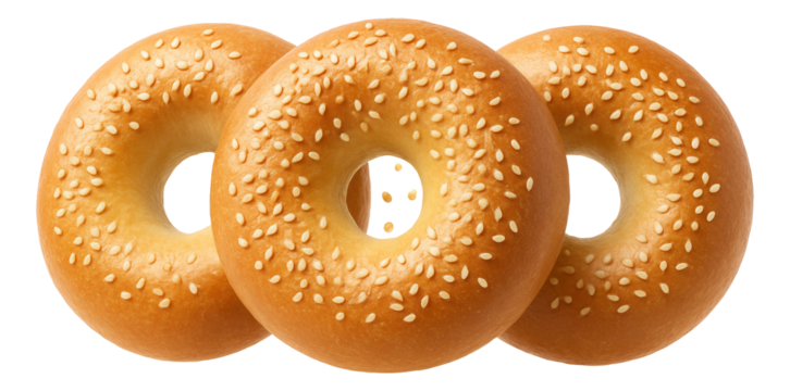 Orange with a symmetrical cut presenting juicy segments on a black slate tile