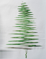 Abstract Green Ribbon Christmas tree shape created with photocopy art technique on paper.