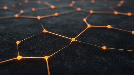 Abstract close-up of an orange glowing network structure on a dark surface representing technology, connections, and digital communication in modern design