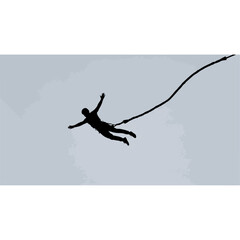 Silhouette of a person bungee jumping from a high place.