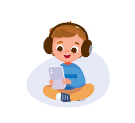 Child boy wearing gadget headset sitting in lotus pose, listening music, streaming, holding smartphone in hands. Kid searching, surfing, and watching the internet using a gadget. Child browsing data.