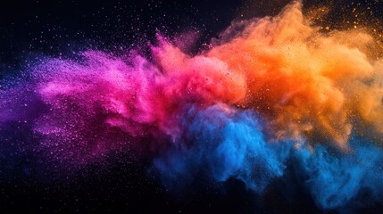 Colorful powder explosion against black background. Possible use Abstract design element