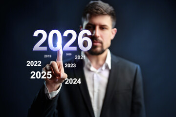 Man interacting with futuristic display showing years from 2019 to 2026