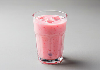Minimalist Photo of Indian Solkadhi Drink with Coconut Milk and Kokum, Featuring its Unique Pastel Pink Color in a Glass with Ice