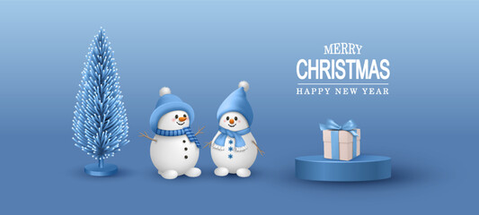 Festive minimalistic composition with cute snowmen in hats and knitted scarves, podium and decorative spruce