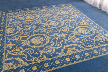 Elegant Blue Carpet with Golden Floral Pattern. Luxury Interior Decor, Ornamental Textile Design, Classic Decorative Rug Background for Hotel, Palace, or Home
