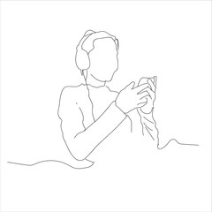 woman listening to music with earphones