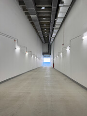 Warehouse, industrial space. Internal loading ramp for trucks to access the second-floor loading docks. Down-ramp.