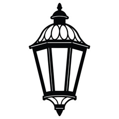 A black silhouette of a  old lantern glowing