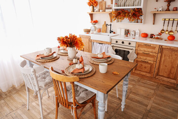 Cozy autumn dining area with warm decorations and seasonal touches