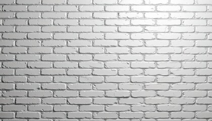 A close up of a section of a white brick wall with a clean, straight joint line that appears to be in the foreground of an interior space