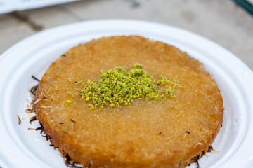Close-Up of Turkish Kunafa Dessert with Pistachios and Cheese
