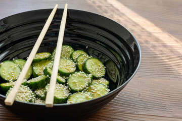 Close-Up of Cucumber Seasoned with Spicy Sauce
